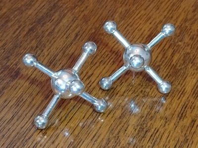 Unusual Pair of Mine Shaped Antique Knife Rests - Connected Balls View One