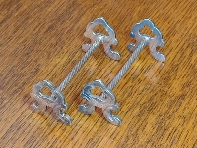 A Shaped Ends With Twisted Centre Bar Silver Plated Antique Knife Rests Right View