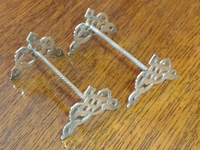 Silver Plated Diamond Design Ends With Twisted Centre Bar Antique Knife Rests Left View