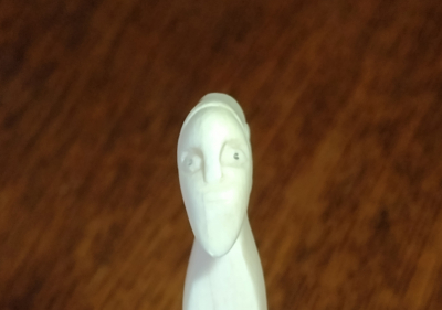 unusual old ivory with carved grotesque head Collectable Antique Knife Rests close up of head