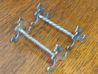 Collectable Silver Plated Fancy Curved Ends With Twisted Centre Antique Knife Rests Left View
